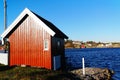 Red wooden garage for boat Royalty Free Stock Photo