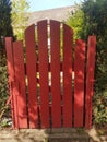 Red wooden gate in Heusenstamm city in Germany