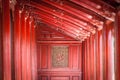 Red wooden hall in Citadel of Hue, Vietnam, Asia.