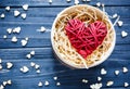 Red wooden heart lies in box on dark table with mini hearts around. St Valentines , Mothers day, romance concept Royalty Free Stock Photo