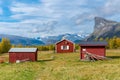 Red wooden house in arctic wilderness. Aktse mountain cabin deep in Sarek National Park, Sweden. Antlers on the wall