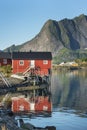 Red wooden house called rorbu on Lofoten Islands