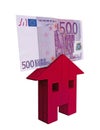 Red wooden house and a 500 euro bill, investments, buy and sell. Mortgage and loans Royalty Free Stock Photo