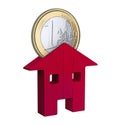 Red wooden house and a euro coin, investments, buy and sell. Mortgage and loans