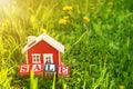 Red wooden house on the grass Royalty Free Stock Photo