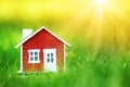 Red wooden house on the grass Royalty Free Stock Photo