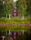 Red wooden house in Sweden Royalty Free Stock Photo