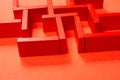 Red wooden labyrinth maze, toy puzzle game, elevated high angle view Royalty Free Stock Photo