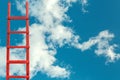 Red Wooden Stairway to Heaven. Road To Success. Achievement Of Goals Career Metaphor Royalty Free Stock Photo