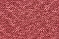 Red wool background with patterns Royalty Free Stock Photo