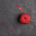 red wool ball slate background. High quality photo Royalty Free Stock Photo