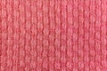 Red wool knitted texture closeup. Natural wool fabric background Royalty Free Stock Photo