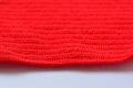 red wool knitted yarn texture, woolen fabric on white background Royalty Free Stock Photo