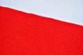 red wool knitted yarn texture, woolen fabric on white background Royalty Free Stock Photo