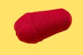 Red wool knitting yarn. Woolen thread for knitting. Own hand. Knitting and needlework. Yarn for a scarf, sweater and socks on a ye Royalty Free Stock Photo