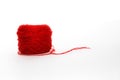 Red wool skein, knitting thread roll, isolated on white background