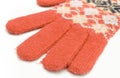 Red woolen gloves on white background. Womanly clothes Royalty Free Stock Photo