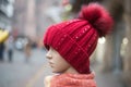 red woolen hat on mabnequin in the street Royalty Free Stock Photo