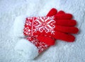 Red woolen mittens on a white background. Royalty Free Stock Photo