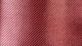 Red woven Black carbon fiber composite material background close up view Royalty Free Stock Photo