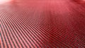 Red woven Black carbon fiber composite material background close up view Royalty Free Stock Photo