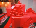 Red wrapped gifts or presents. Prepare for christmas and new year. Wrapping gifts concept. Magic moments. Prepare Royalty Free Stock Photo