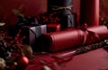 red wrapping paper with wrapping paper in front of christmas gifts Royalty Free Stock Photo