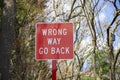 Red wrong way go back sign in the road Royalty Free Stock Photo