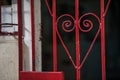 Heart shaped detail on a Havana street with rod iron bars