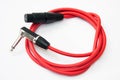 Red xlr microphone cable on the white background Royalty Free Stock Photo