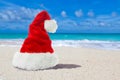 Red Xmas or christmas Santa Hat paradise beach Royalty Free Stock Photo