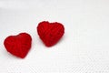 Red yarn ball like a heart on the white crochet background. Romantic Valentines Day concept. Red heart made of wool yarn with plac Royalty Free Stock Photo