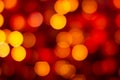 Red and yellow abstract background with bokeh defocused blurred lights. Royalty Free Stock Photo
