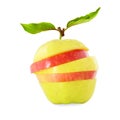 Red and yellow apple slice with leaves closeup Royalty Free Stock Photo