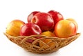 Red and yellow apples in the basket Royalty Free Stock Photo