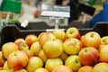 Red and yellow apples in the boxes in big grocery store. ripe apples Royalty Free Stock Photo