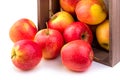 Apples in a wooden crate. Isolate on white background Royalty Free Stock Photo