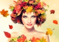 Red and yellow autumn Leaves on girl head. Royalty Free Stock Photo