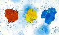 Red, yellow and blue watercolor stains on a background of light blue stains. Blue and yellow splashes from above background. Royalty Free Stock Photo