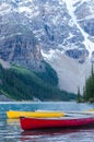 Red and yellow canoes on Moraine Lake