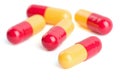 Red and yellow capsule pills isolated Royalty Free Stock Photo