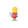 Red yellow capsules mascot cartoon design make a call gesture