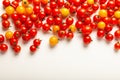 Red and yellow cherry tomatoes isolated on white background. Fresh bright organic vegetables Royalty Free Stock Photo