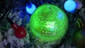 Red and yellow Christmas balls, UFO Green fireballs glowing spheres and cubes, winking lights, Proton Purple angels, snowmen