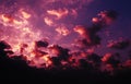 Red and yellow clouds illuminated by rising sun Royalty Free Stock Photo