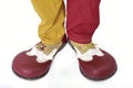 Red and yellow clown shoes isolated on white background Royalty Free Stock Photo