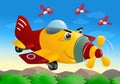 Red and yellow commercial plane flying Royalty Free Stock Photo