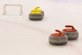 Red and Yellow Curling Stones with Stabilizer Bar