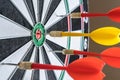 Red and yellow dart arrows hitting in the target center of dartboard. Success hitting target aim goal achievement concept Royalty Free Stock Photo