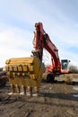 Excavator at muddy jobsite